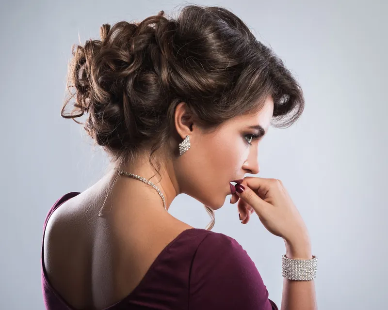 Formal curled updo styled for a special occasion at New Image Hair Salon, Cape Cod